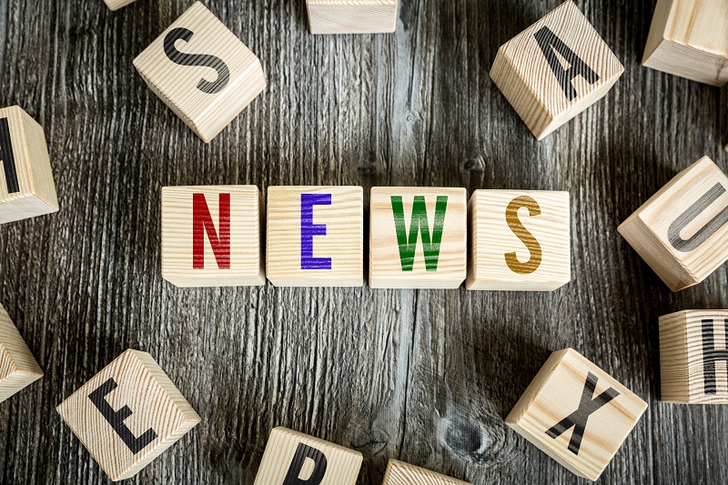 News spelt in wooden blocks